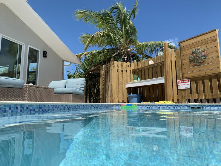 Pool at Coastal Vibes Villa overlooking Chalk Sound!